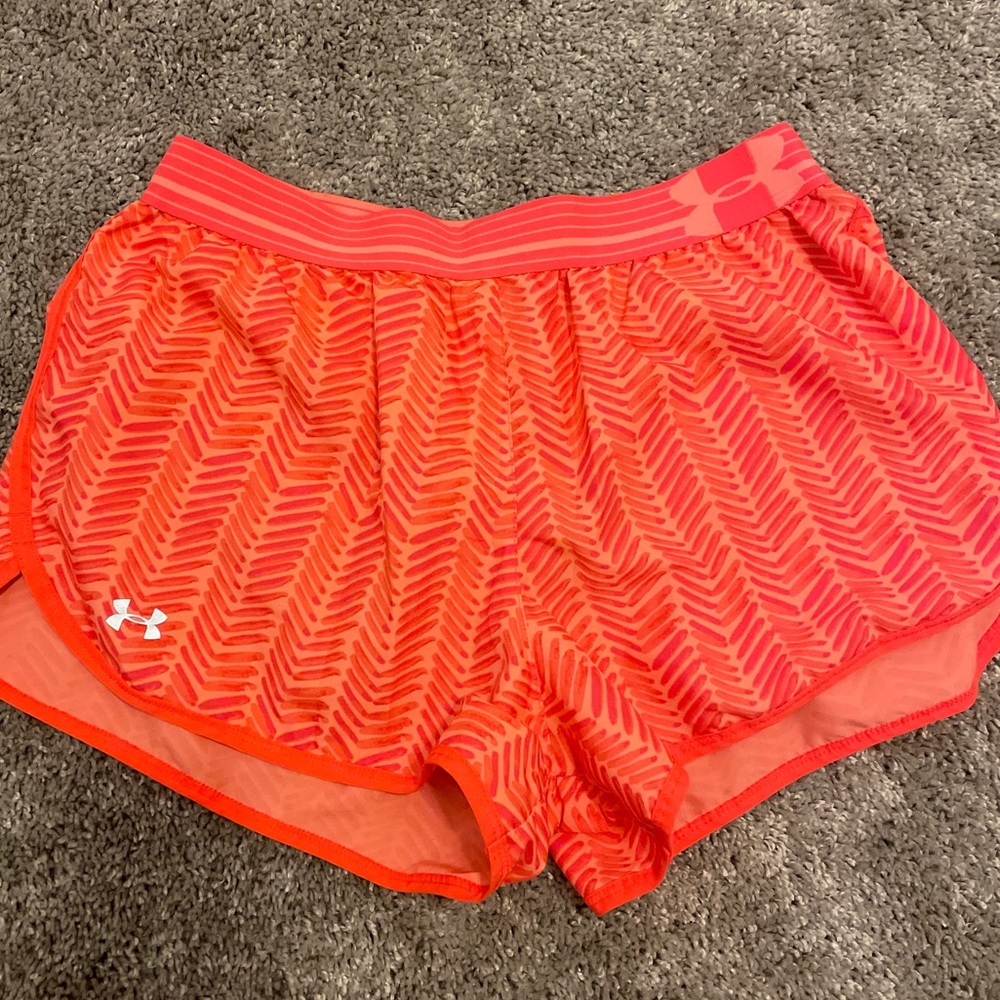 Orange UA athletic shorts